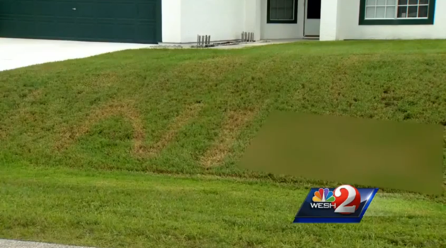 CREDIT: WESH A Florida man found a racial slur burned into his front yard.