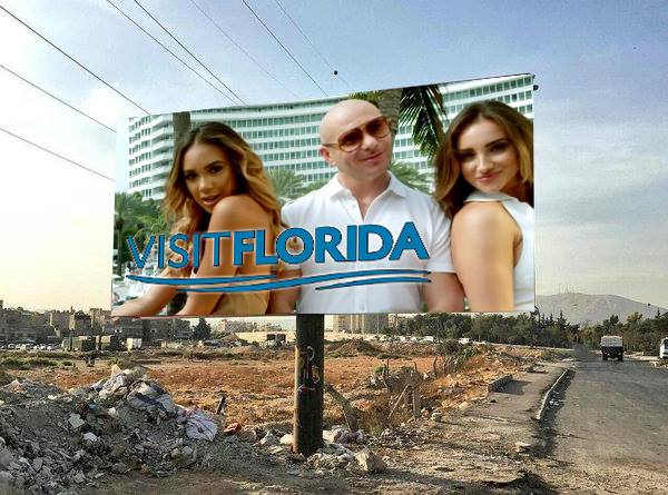 Satirical billboard of Pitbull / Visit Florida set in Syria