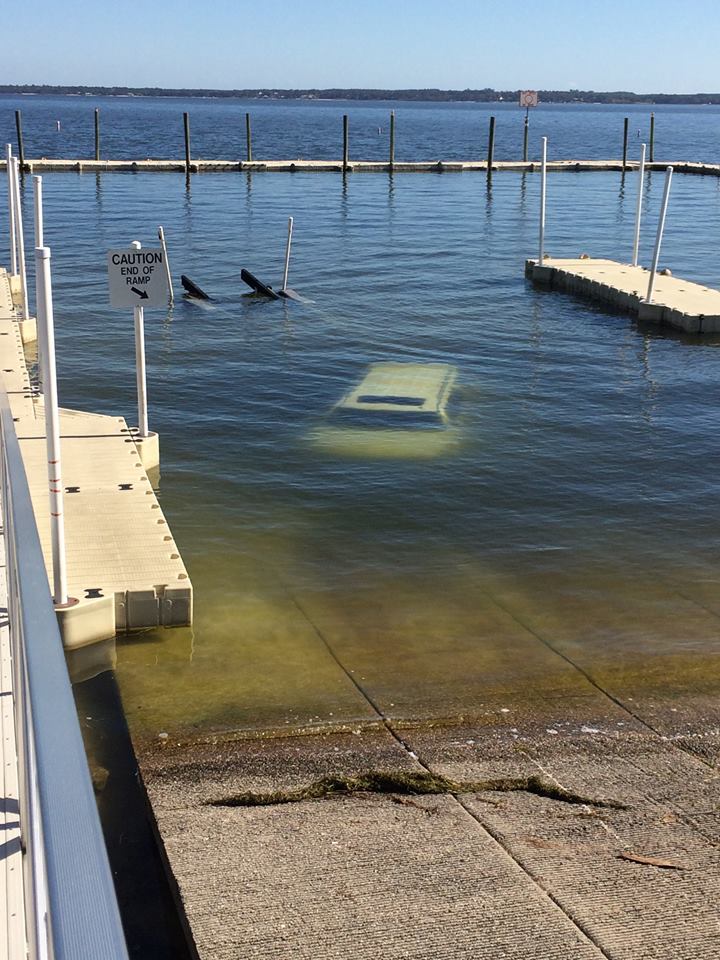 florida man parks his cadillac escalade in lake weir