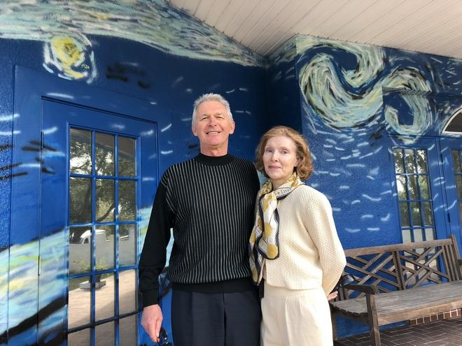 Homeowners Nancy Nemhauser and Ludomir Jastrzebski in front of their “Starry Night” house. (ROXANNE BROWN / DAILY COMMERCIAL)